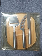 NEW 4 piece heavy round cheese